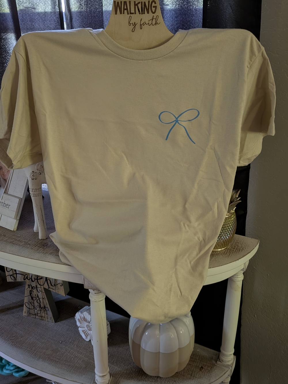 Gildan Short Sleeve Tee in Light Cream with Blue Bow Graphic